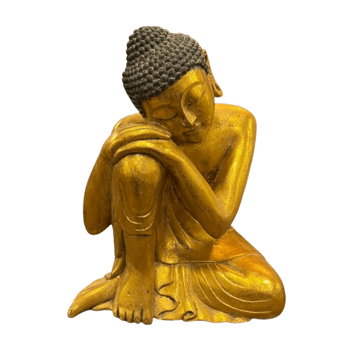 Buda dorado en posición de meditación.